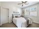 Cozy bedroom features a ceiling fan, natural light, and a calming color scheme at 364 Concord St, Alpharetta, GA 30009