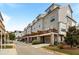 Townhome exterior with garages, wooden decks and brick supports at 364 Concord St, Alpharetta, GA 30009