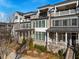 Charming multi-story townhome exterior with brick facade, balconies, and well-maintained landscaping at 364 Concord St, Alpharetta, GA 30009