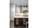 Kitchen with a large island with seating and storage under countertop at 364 Concord St, Alpharetta, GA 30009