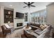 Cozy living room with fireplace, built-in shelving, and ample natural light at 364 Concord St, Alpharetta, GA 30009