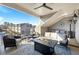 Inviting covered patio with nice seating, an outdoor fireplace, and a great view at 364 Concord St, Alpharetta, GA 30009