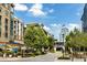 Vibrant street scene featuring a variety of shops, restaurants, modern buildings and lush greenery at 364 Concord St, Alpharetta, GA 30009
