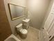 Tile bathroom with a vanity, toilet, and bath and shower with tile surround at 709 Pine Tree Trl # 10A, Atlanta, GA 30349