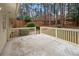 View of the outdoor patio and backyard with white railing at 2151 Zelda Ne Dr, Atlanta, GA 30345