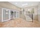 The finished basement includes stairs, tiled flooring, sliding doors, and multiple windows at 2151 Zelda Ne Dr, Atlanta, GA 30345