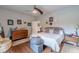 Bedroom with hardwood floors featuring natural light and cozy decor at 3157 Oakdale Rd, Hapeville, GA 30354