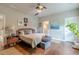 Bedroom with hardwood floors and neutral paint, offering a peaceful retreat at 3157 Oakdale Rd, Hapeville, GA 30354