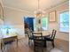 Elegant dining room with modern lighting and stylish decor at 3157 Oakdale Rd, Hapeville, GA 30354