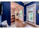 Inviting entryway features stylish blue walls and wood-look floors at 3157 Oakdale Rd, Hapeville, GA 30354