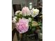 Bouquet of lovely peonies, offering a fresh and fragrant accent to the room at 3157 Oakdale Rd, Hapeville, GA 30354