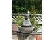 Zen garden featuring a stone Buddha fountain, creating a peaceful outdoor retreat at 3157 Oakdale Rd, Hapeville, GA 30354