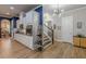 Hallway view showing stairway, kitchen, and open floorplan at 3157 Oakdale Rd, Hapeville, GA 30354