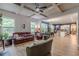 Spacious living room boasts a coffered ceiling, fireplace, and ample natural light at 3157 Oakdale Rd, Hapeville, GA 30354
