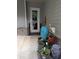 The patio features a variety of potted plants, creating a relaxing and inviting outdoor space at 3157 Oakdale Rd, Hapeville, GA 30354