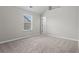 Bright bedroom with neutral carpet, vaulted ceiling, and large window at 4102 Dinmont Chase, Atlanta, GA 30349