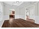 Elegant dining area with coffered ceiling, wainscotting, and hardwood floors, perfect for gatherings at 4102 Dinmont Chase, Atlanta, GA 30349