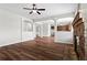 Inviting layout featuring dark hardwood floors and elegant archways at 4102 Dinmont Chase, Atlanta, GA 30349