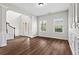 Spacious living room featuring hardwood floors, neutral walls, and a bright, open atmosphere at 4102 Dinmont Chase, Atlanta, GA 30349