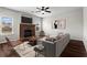 Inviting living room with stone fireplace and hardwood floors at 4102 Dinmont Chase, Atlanta, GA 30349