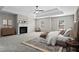 Large main bedroom features a trey ceiling, fireplace, neutral carpet and abundant natural light at 4102 Dinmont Chase, Atlanta, GA 30349