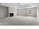 Expansive main bedroom boasting a fireplace, trey ceiling, and neutral gray carpet at 4102 Dinmont Chase, Atlanta, GA 30349