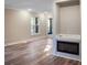Bright living room features hardwood floors and a modern fireplace insert at 4830 Rebel Nw Trl, Sandy Springs, GA 30327