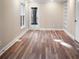 Inviting living room with wood flooring and neutral paint throughout at 4830 Rebel Nw Trl, Sandy Springs, GA 30327