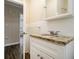 Bathroom features granite vanity and updated fixtures at 1438 Joy Ln, Decatur, GA 30032