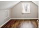 Attic space features a window and wood floors; perfect for storage or expansion at 2003 Cogar Dr, Decatur, GA 30032