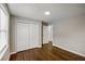 Neutral bedroom features hardwood floors and a large closet at 2003 Cogar Dr, Decatur, GA 30032