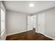 Neutral bedroom features hardwood floors and a large doorway at 2003 Cogar Dr, Decatur, GA 30032