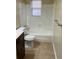 Bathroom featuring a shower-tub combo and vanity at 3611 Spring Pt, Decatur, GA 30034