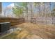 View of the backyard area with a privacy fence, and mature trees at 96 Trailview Lane Ln, Hiram, GA 30141