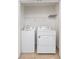 Laundry closet with washer, dryer and wire shelving at 96 Trailview Lane Ln, Hiram, GA 30141