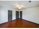 Bright bedroom with hardwood floors, ceiling fan, and multiple closets for ample storage at 1017 Martin Luther King Jr Dr, Atlanta, GA 30314