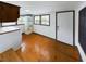 Bright laundry room with hardwood floors, and storage, ideal for efficient home management at 1017 Martin Luther King Jr Dr, Atlanta, GA 30314