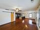 Spacious living room showcasing hardwood floors, a barn door, open layout, and ample natural light at 1017 Martin Luther King Jr Dr, Atlanta, GA 30314