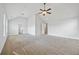 Bright, spacious bedroom with vaulted ceiling, ceiling fan, and multiple windows at 2098 Bridgewater Pass, Hampton, GA 30228