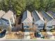 Overhead community shot showcasing the townhome exteriors and streetscape at 507 Ridge View Xing, Woodstock, GA 30188