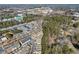 Aerial view of a residential community with trees and roads, showcasing the neighborhood layout at 507 Ridge View Xing, Woodstock, GA 30188