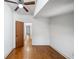 Bedroom featuring hardwood floors, neutral walls, and an open doorway at 507 Ridge View Xing, Woodstock, GA 30188