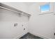 Laundry Room with tile floors, neutral walls, and window at 507 Ridge View Xing, Woodstock, GA 30188