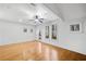 Spacious living room featuring hardwood floors, neutral walls, and ample natural light at 507 Ridge View Xing, Woodstock, GA 30188