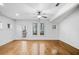 Bright living room featuring hardwood floors, neutral walls, and ample natural light at 507 Ridge View Xing, Woodstock, GA 30188