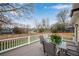 Back deck with outdoor dining set overlooking private fenced backyard at 731 Mollie Se St, Atlanta, GA 30316