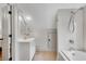 Bright bathroom with modern fixtures, white tile shower, and a vanity at 731 Mollie Se St, Atlanta, GA 30316