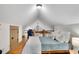 Light-filled bedroom featuring hardwood floors and an office nook at 731 Mollie Se St, Atlanta, GA 30316