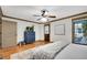 Bedroom with hardwood floors, view of the window, and a door to a closet at 731 Mollie Se St, Atlanta, GA 30316