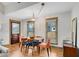 Cozy dining room with a modern light fixture and comfortable seating for Gathering meals at 731 Mollie Se St, Atlanta, GA 30316